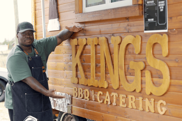 Cook next to trailer